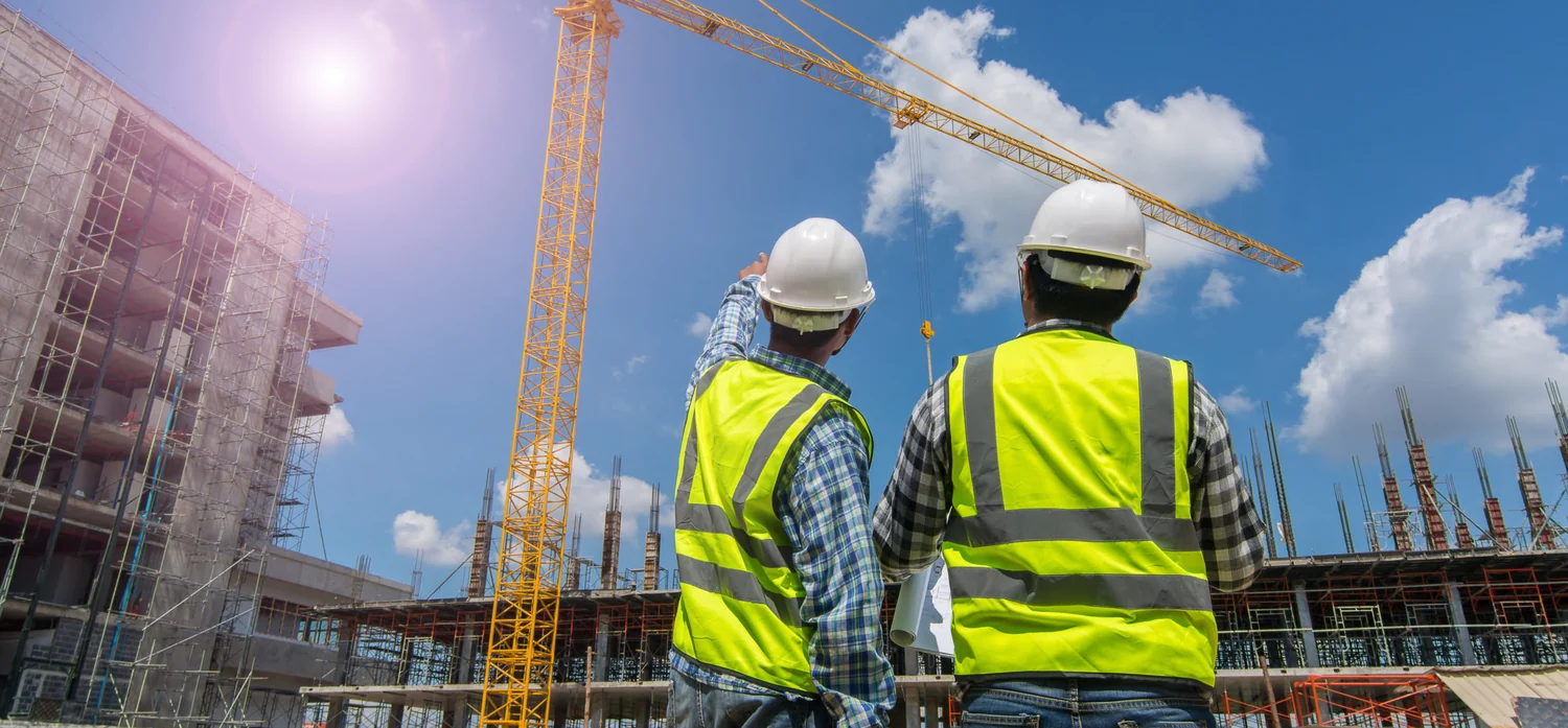 Construction team coordinating work on an active site